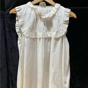 Elegant Cream Sleeveless Silk Top by Kate Spade